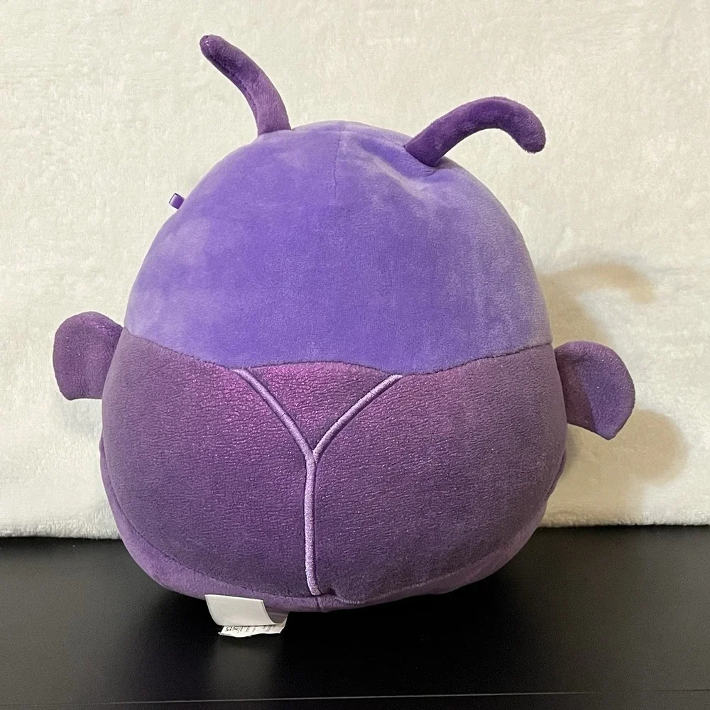 Squishmallows axel purple